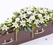 White Lily and White Rose Casket Spray Code: F13520WS | National and Local Delivery