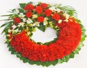 Red Carnation Wreath Code: JGFF2960RCW | Local Delivery Or Collect From Shop Only