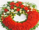 Red Carnation Wreath Code: JGFF2960RCW | Local Delivery Or Collect From Shop Only