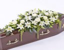 White Lily and White Rose Casket Spray Code: F13520WS | National and Local Delivery