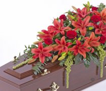 Red Lily and Red Rose Casket Spray Code: F13520RS | National and Local Delivery