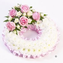 Traditional Pink and White Bassed Wreath Code: F13680PS | National Delivery and Local Delivery Or Collect From Shop