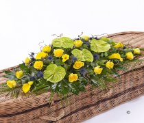 Yellow Green And Blue Woodland Casket Spray Code: F13610YS | National and Local Delivery