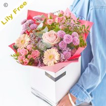 Lily Free Florists Choice Hand tied bouquet made with seasonal flowers Code: LFHT1 | National Delivery and Local Delivery Or Collect From Shop