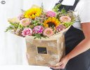 Lily Free Florists Choice Hand tied bouquet made with seasonal flowers Code: LFHT6S | National Delivery and Local Delivery Or Collect From Shop