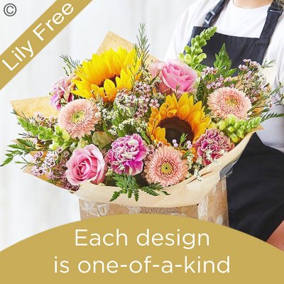 Lily Free Florists Choice Hand tied bouquet made with seasonal flowers Code: LFHT6S | National Delivery and Local Delivery Or Collect From Shop