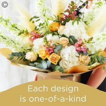 Lily Free Florists Choice Hand tied bouquet made with seasonal flowers Code: LFHT11S | National Delivery and Local Delivery Or Collect From Shop